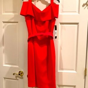 Gorgeous orange Badgley Mischka off the shoulder dress. Very elegant for dinner